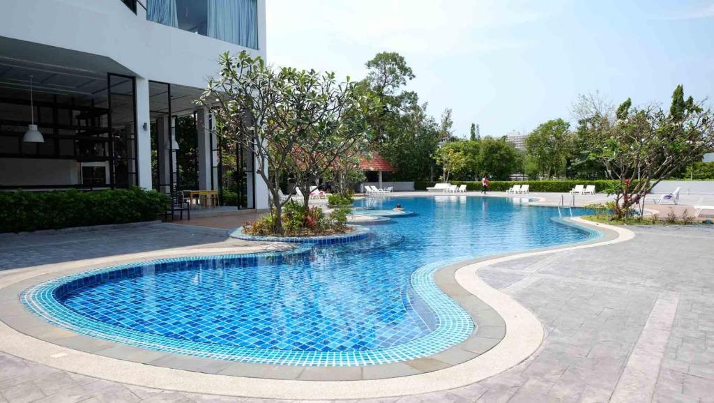 Bazén v ubytování Welcome Jomtien Beach Hotel nebo v jeho okolí