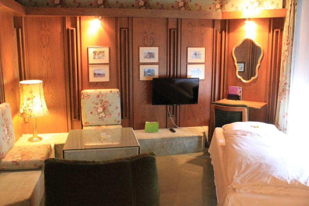 Postel nebo postele na pokoji v ubytování Hotel Spahr