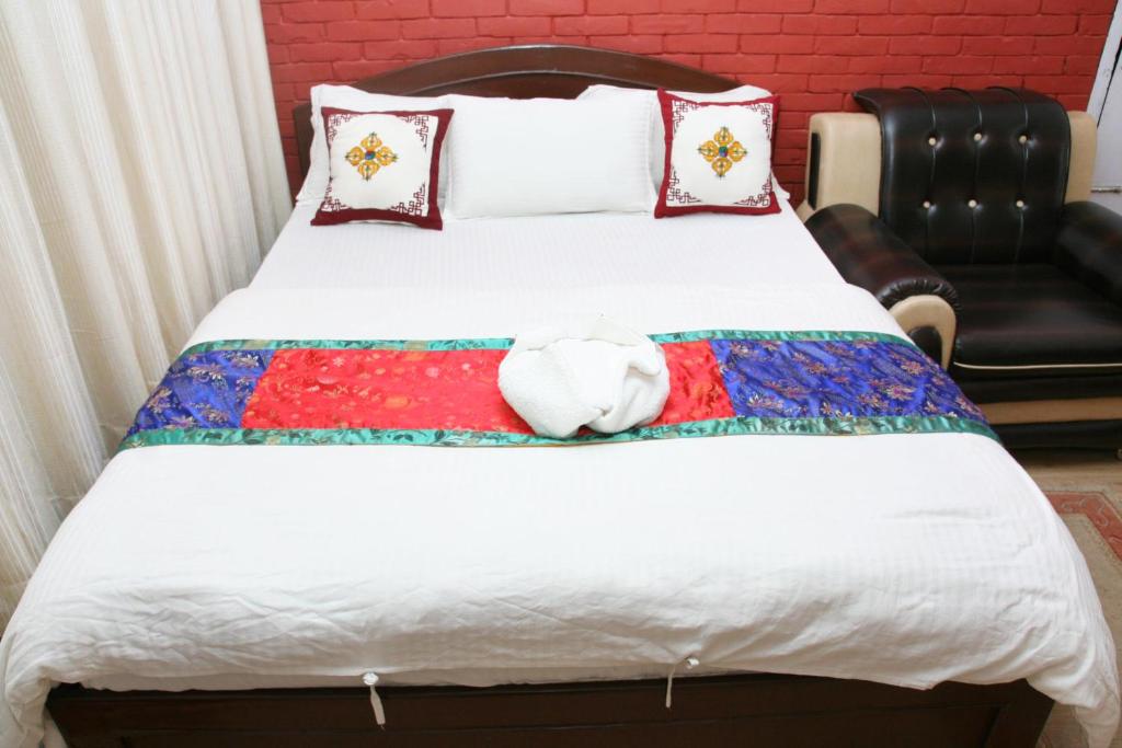 Postel nebo postele na pokoji v ubytování Thamel Backpackers Home