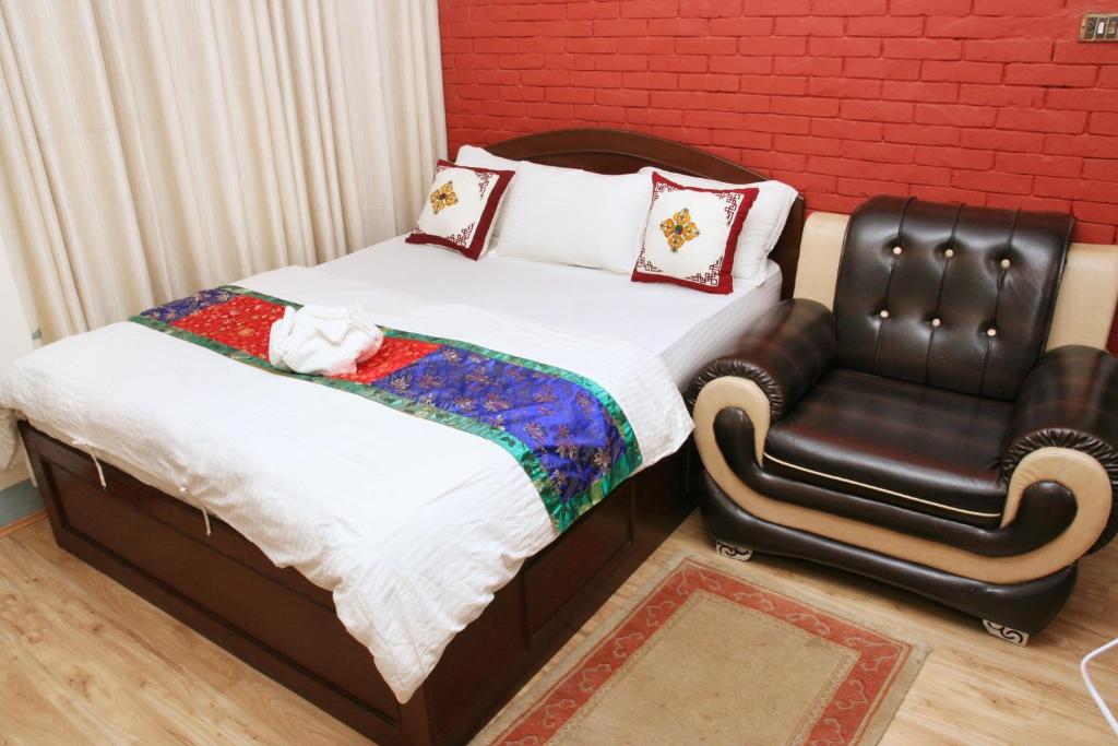 Postel nebo postele na pokoji v ubytování Thamel Backpackers Home