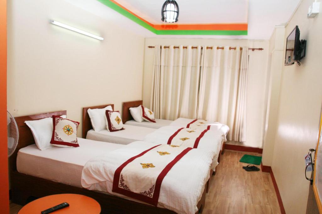 Postel nebo postele na pokoji v ubytování Thamel Backpackers Home
