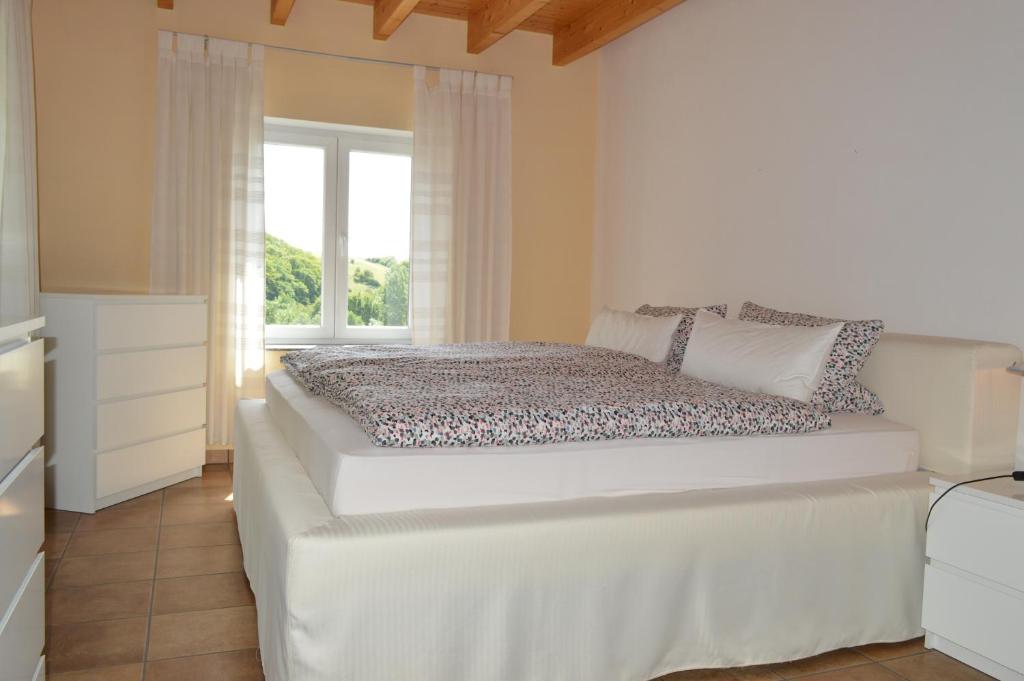 Postel nebo postele na pokoji v ubytování Ferienhaus Eifel