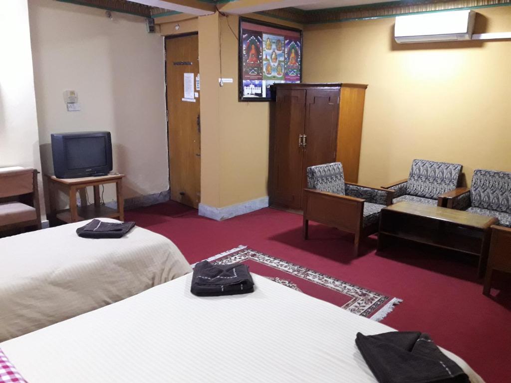 TV a/nebo společenská místnost v ubytování Hotel Metropolitan Kantipur