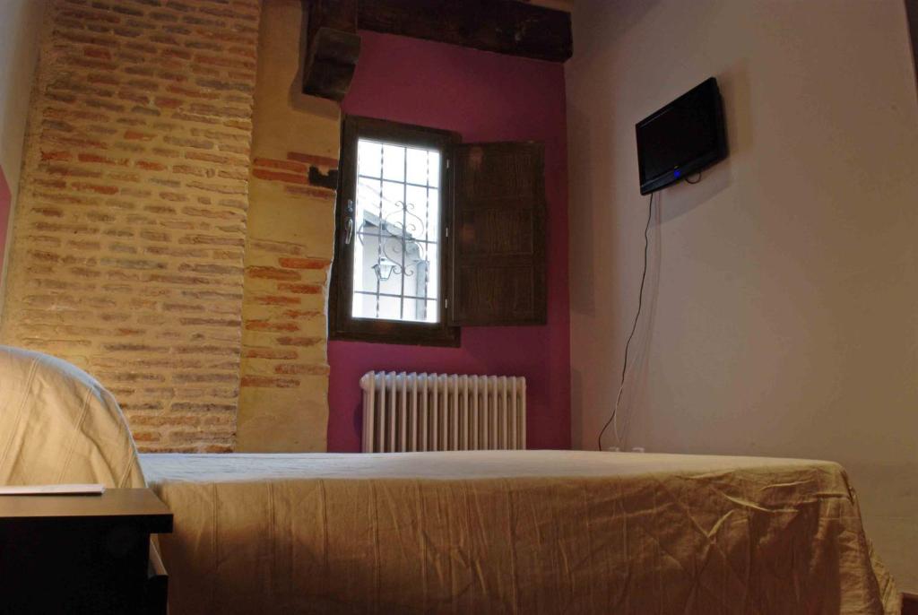 TV a/nebo společenská místnost v ubytování Hosteria Natura Plaza