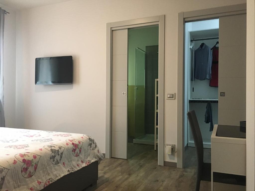 TV a/nebo společenská místnost v ubytování B&B ARCOBALENO