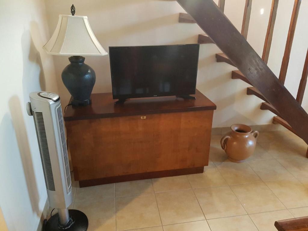 TV a/nebo společenská místnost v ubytování Casa Claudia