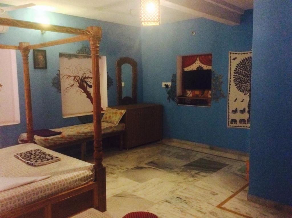 Postel nebo postele na pokoji v ubytování Namaste Caffe-for heritage stay