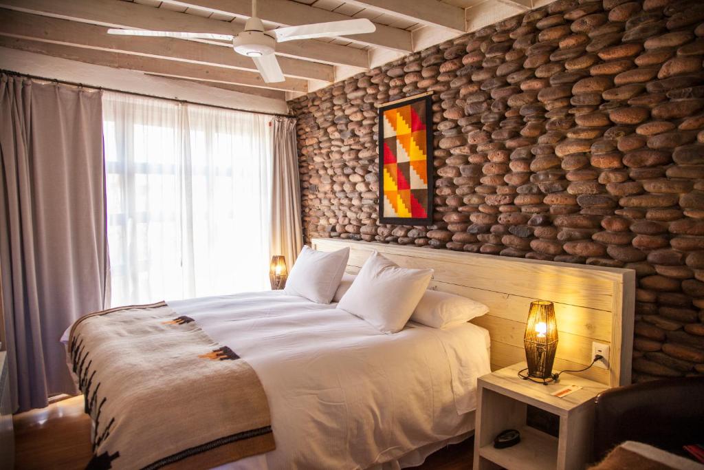 Postel nebo postele na pokoji v ubytování Terrantai Lodge
