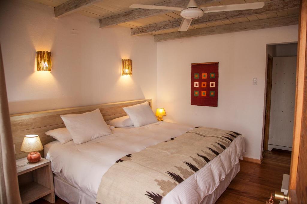 Postel nebo postele na pokoji v ubytování Terrantai Lodge