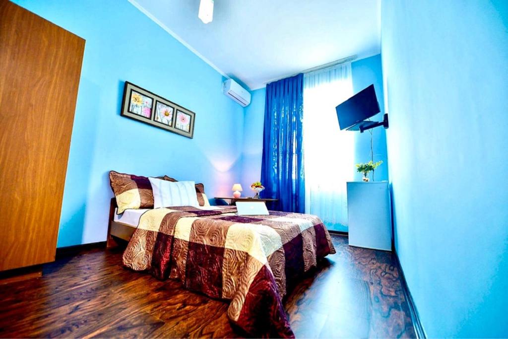 Postel nebo postele na pokoji v ubytování Europa Hotel-Kutaisi