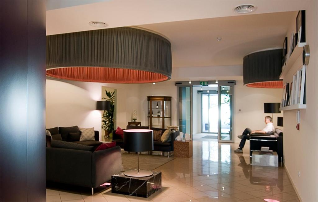 TV a/nebo společenská místnost v ubytování Hotel Oliva