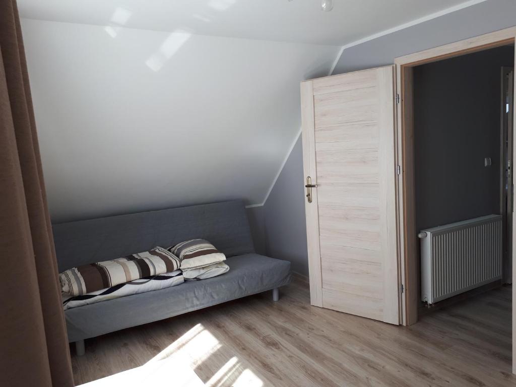 Posteľ alebo postele v izbe v ubytovaní Apartamenty Otylka