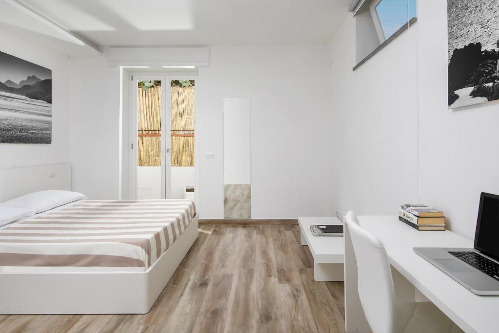 Postel nebo postele na pokoji v ubytování Casa Cristina