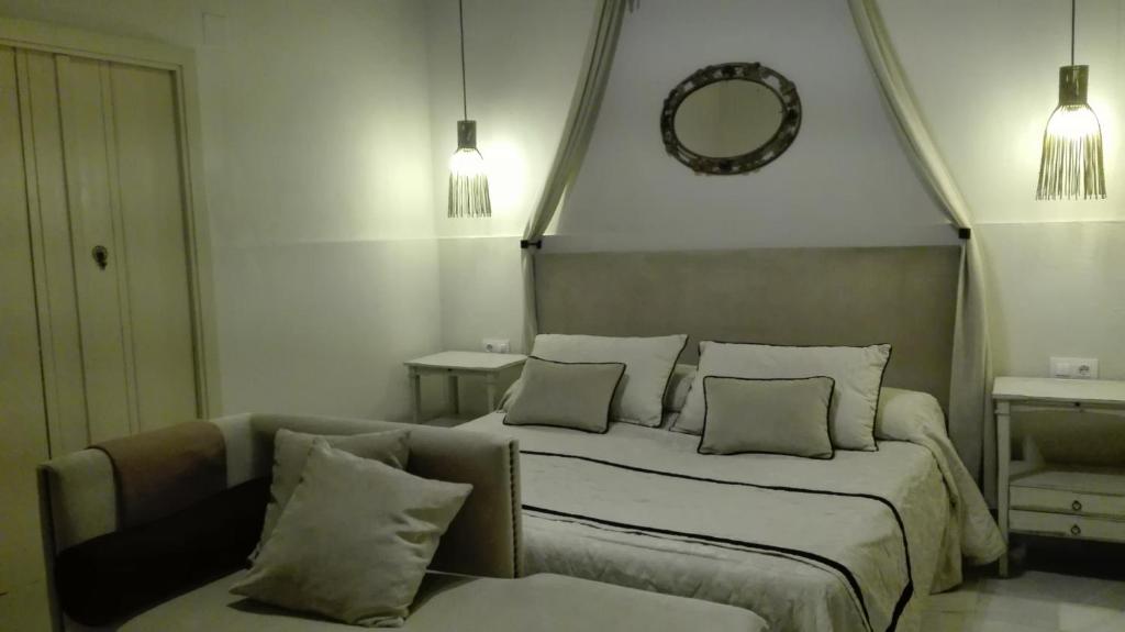 A bed or beds in a room at Estudio Bizcocheros