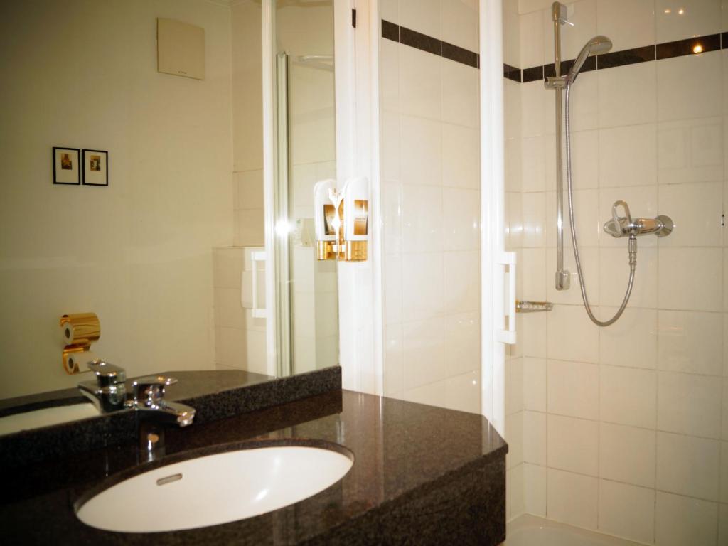 Koupelna v ubytování Entrée Groß Borstel Garni Hotel