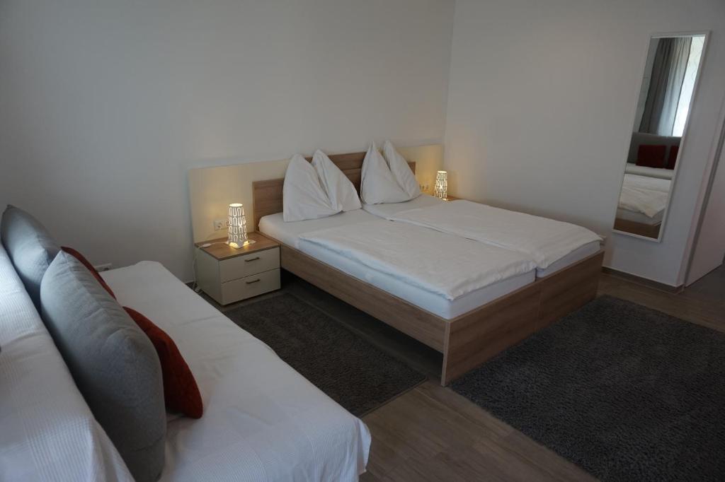 A bed or beds in a room at Gösserhof