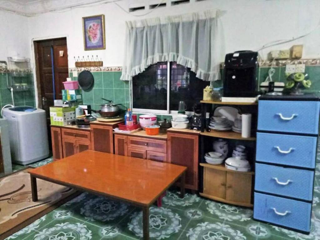 Kuchyň nebo kuchyňský kout v ubytování Farzai Homestay