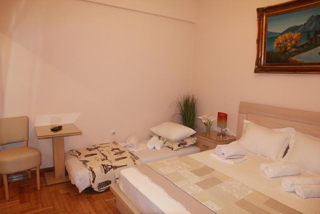 A bed or beds in a room at Olga's Studio