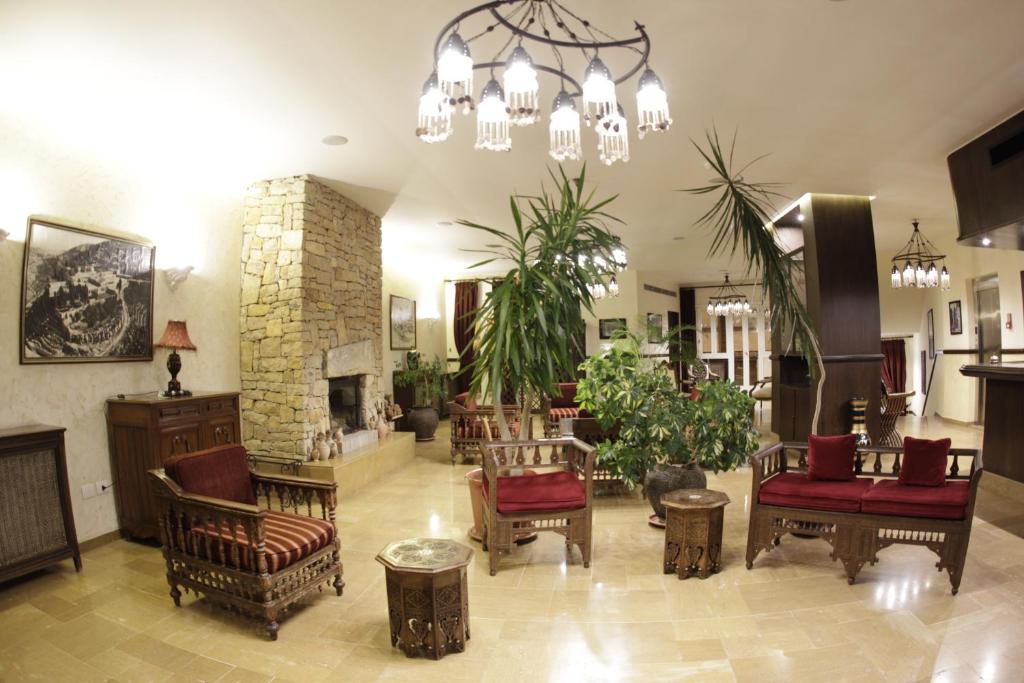 Posezení v ubytování Quartier Suisse Hotel