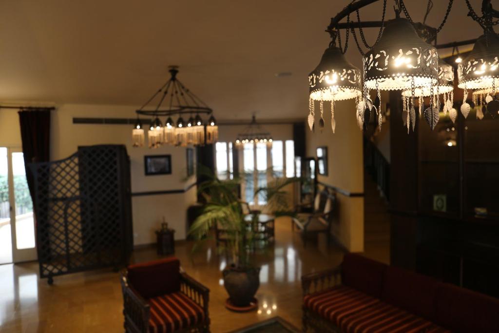 Posezení v ubytování Quartier Suisse Hotel