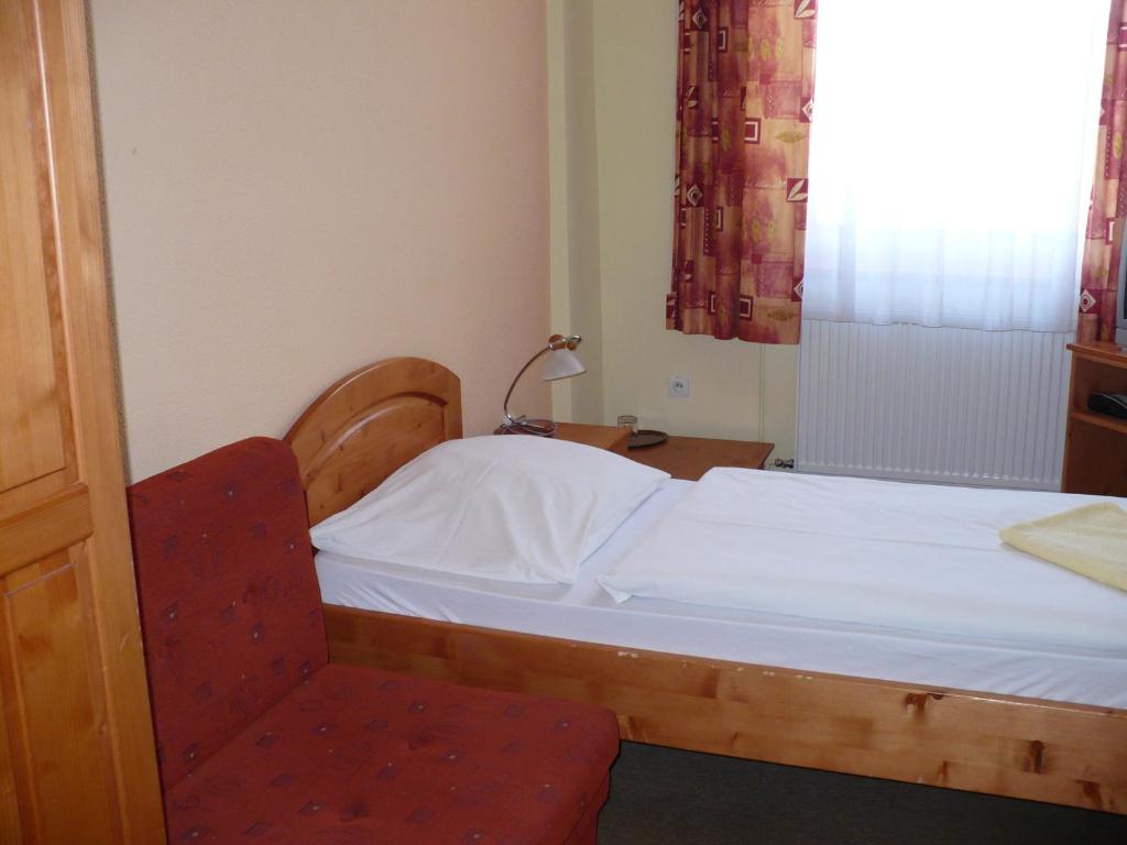 Postel nebo postele na pokoji v ubytování Motel Ranč