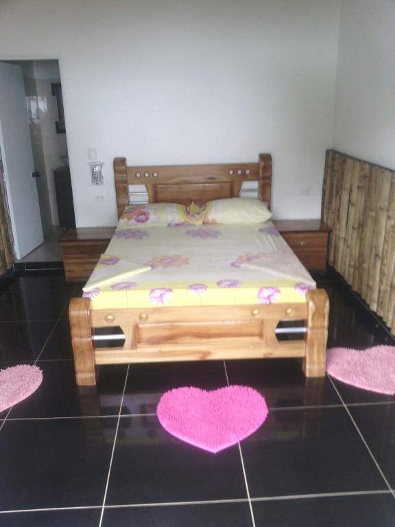 Voodi või voodid majutusasutuse Hostal Hilltop Capurgana toas
