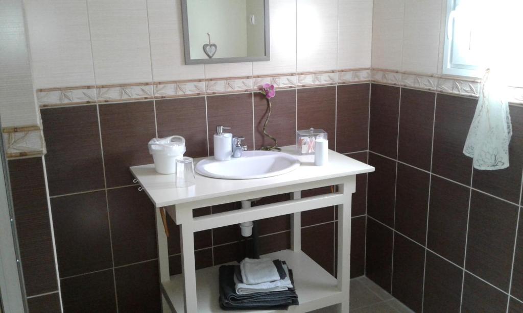 Koupelna v ubytování Chambre d'hotes Le Hamel