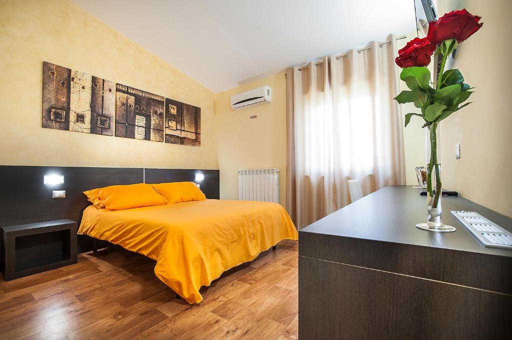 Postel nebo postele na pokoji v ubytování B&B Portacastello