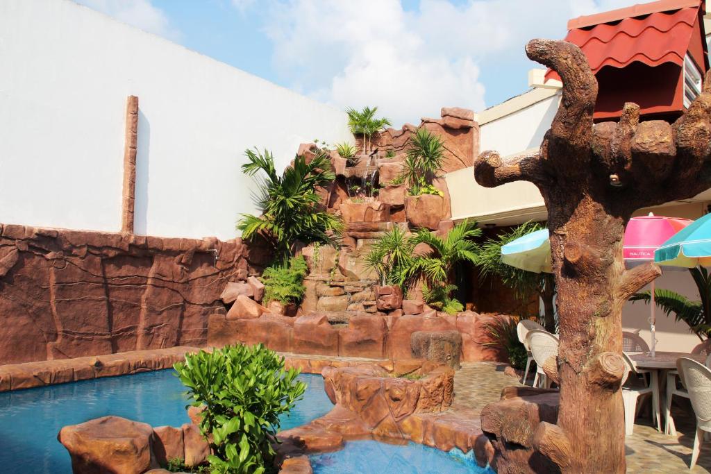 Bazén v ubytování Hotel San Rafael nebo v jeho okolí