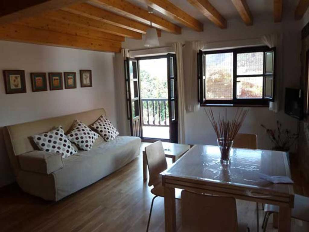 Posedenie v ubytovaní Apartamentos Casa de la Abuela
