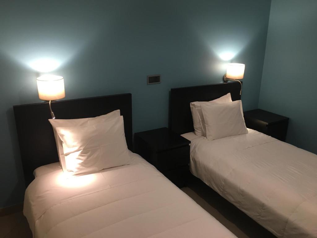 Postel nebo postele na pokoji v ubytování Apartamentos Basalto
