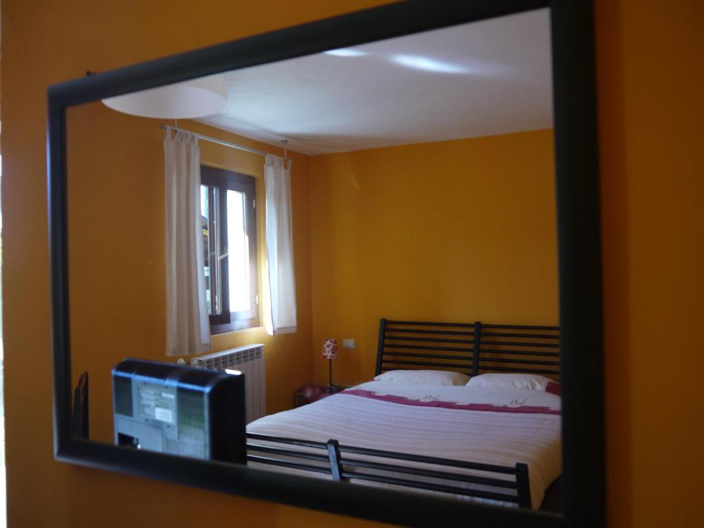 Postel nebo postele na pokoji v ubytování La Bordigona