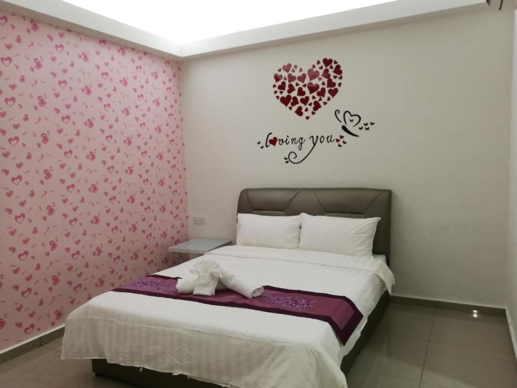 Postel nebo postele na pokoji v ubytování D' Cozy Inn