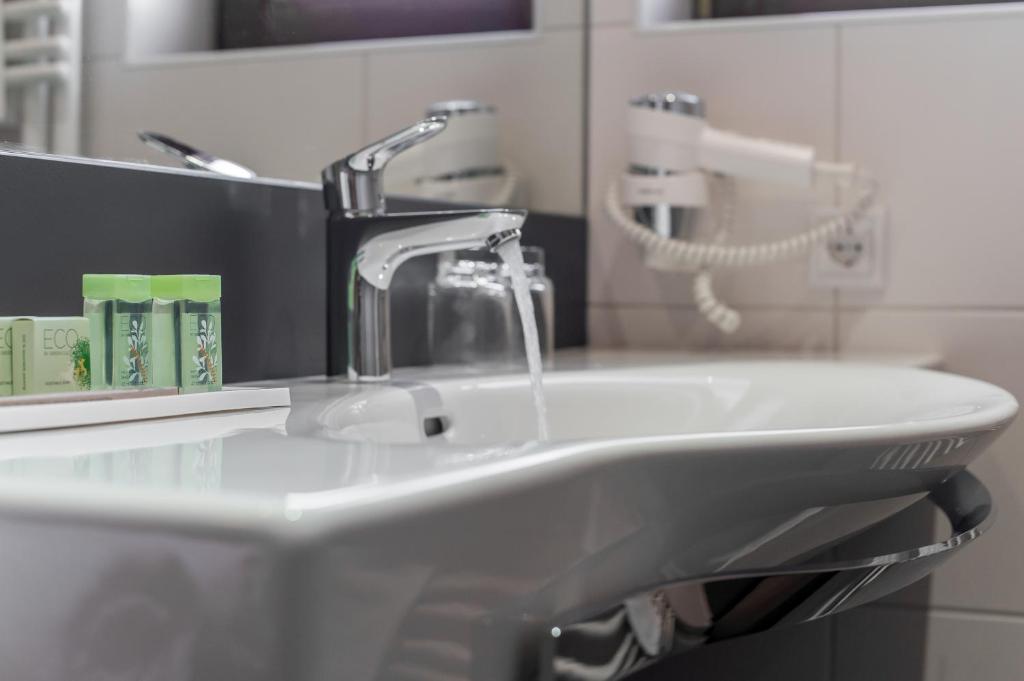 Koupelna v ubytování Hotel Garni Pirchhütt
