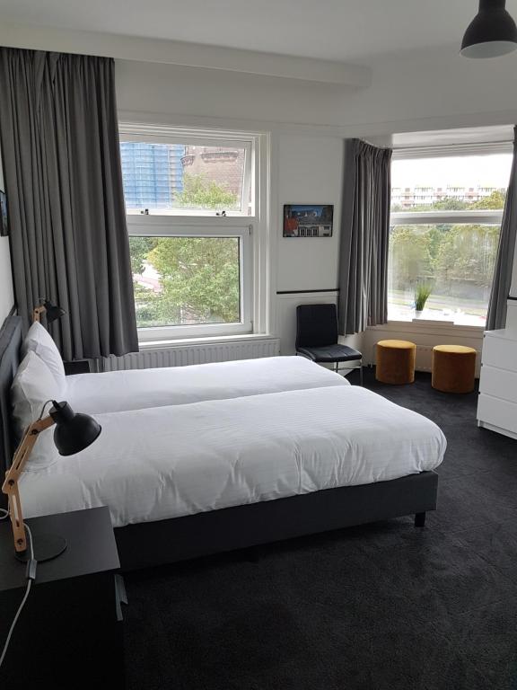 Een bed of bedden in een kamer bij Stad & Strandhotel Elisabeth