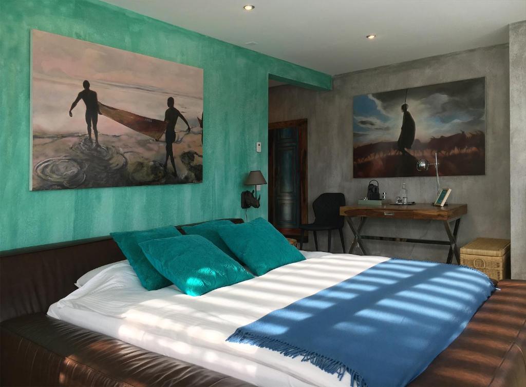 Postel nebo postele na pokoji v ubytování No1 Art B&B