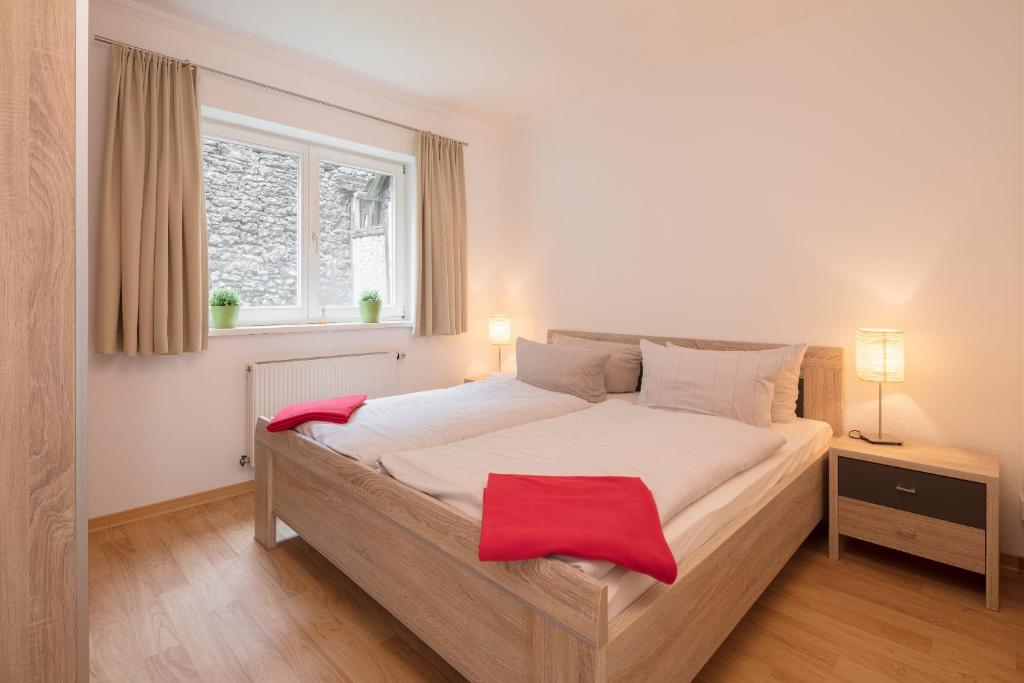Ein Bett oder Betten in einem Zimmer der Unterkunft Hotel an der Stadtmauer