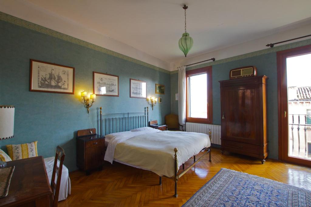 Postel nebo postele na pokoji v ubytování B&B S.Marco