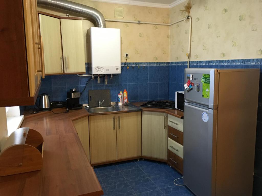 Kuchyň nebo kuchyňský kout v ubytování Гостевой дом Юран