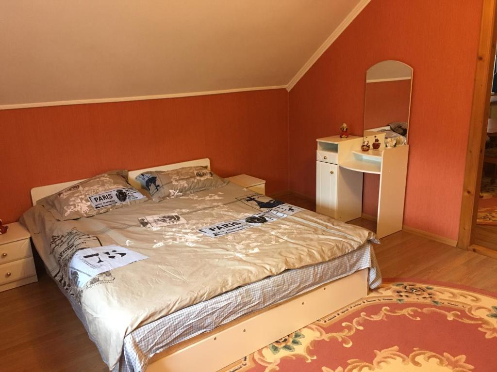 Postel nebo postele na pokoji v ubytování Гостевой дом Юран