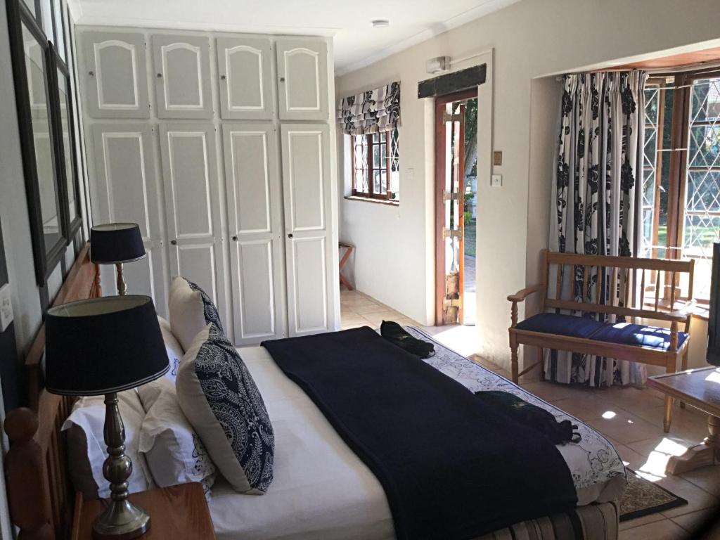 Warrens Guest House - Camera Tripla Con Vista Giardino