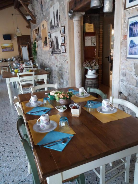 Reštaurácia alebo iné gastronomické zariadenie v ubytovaní Agriturismo Antiche Mura
