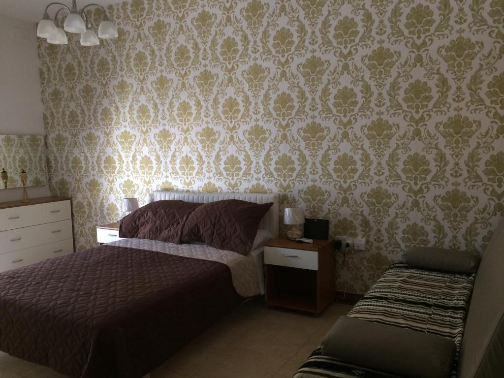 Postel nebo postele na pokoji v ubytování SEAVIEW Marsascala Apartment