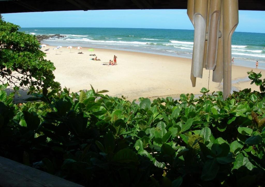 a view of the beach from a balcony at Pousada Shangri-lá in Itacaré