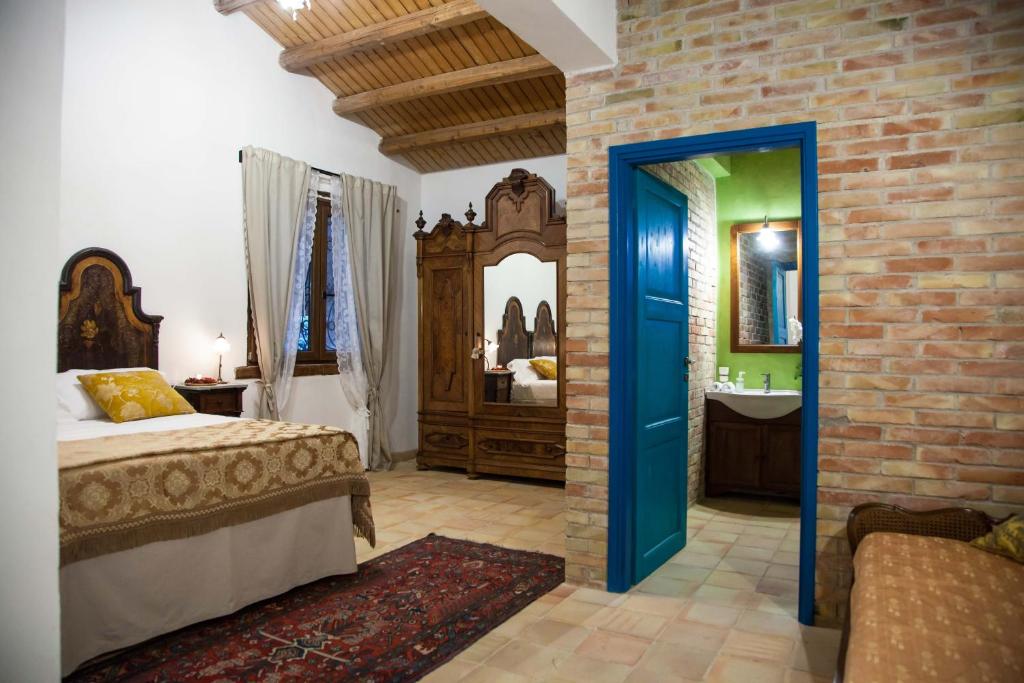 Postel nebo postele na pokoji v ubytování Casa Go'El