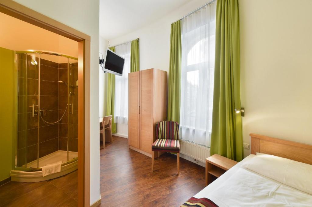 Uma cama ou camas num quarto em Hotel Mocca