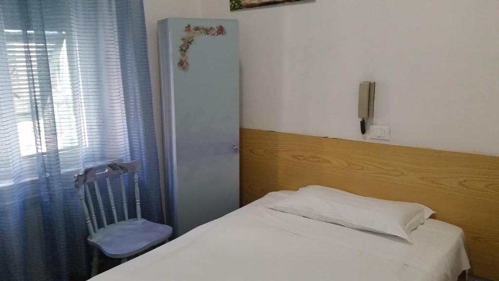 Postel nebo postele na pokoji v ubytování Hotel Guesthouse MASSENA