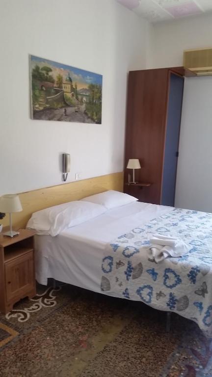 Postel nebo postele na pokoji v ubytování Hotel Guesthouse MASSENA