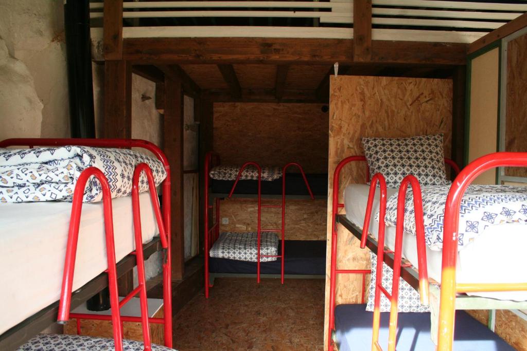 Postel nebo postele na pokoji v ubytování Albergue Les Xendes. Parque de Redes