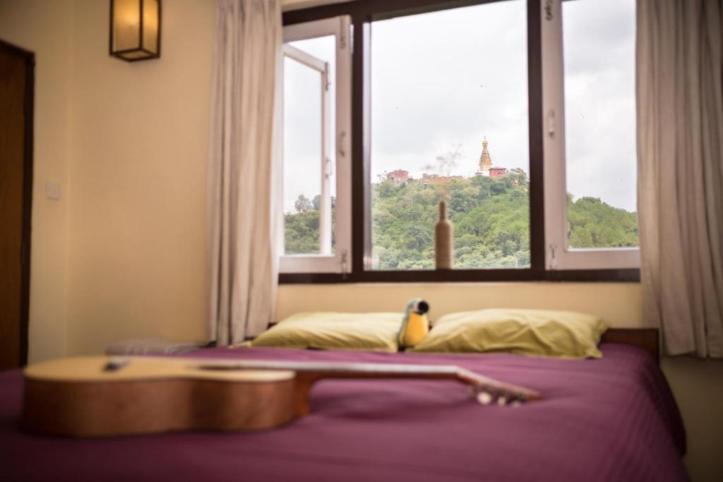 Letto o letti in una camera di Swayambhu View Guest House